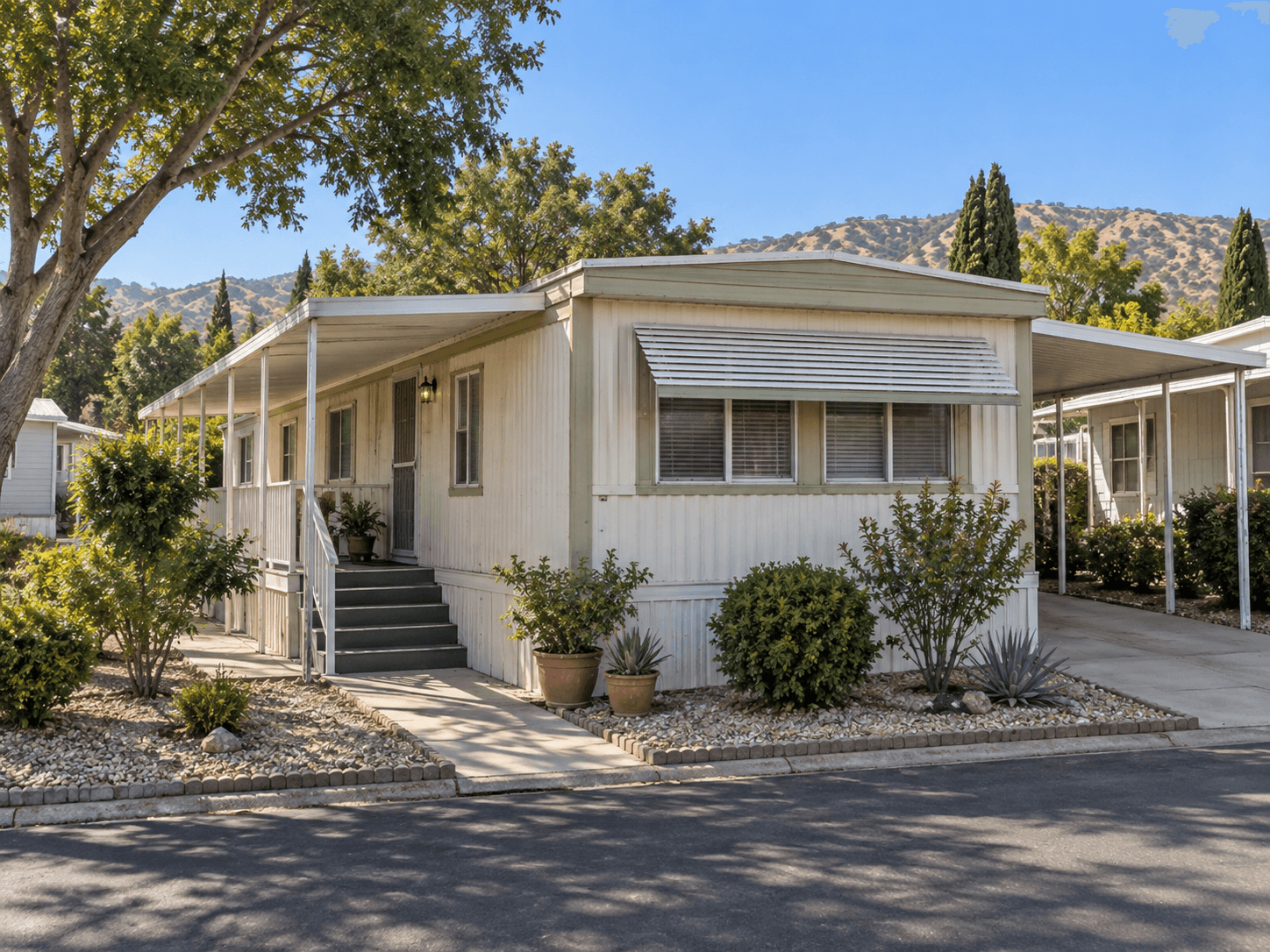 AI-generated older mobile home with an aluminum awning, skirting, and landscaped community space